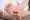 Close up woman foot scratch the itch by hand at home. Healthcare and medical concept.