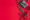 Christmas composition. Gift box, christmas decorations on red background. Flat lay, top view, copy space
